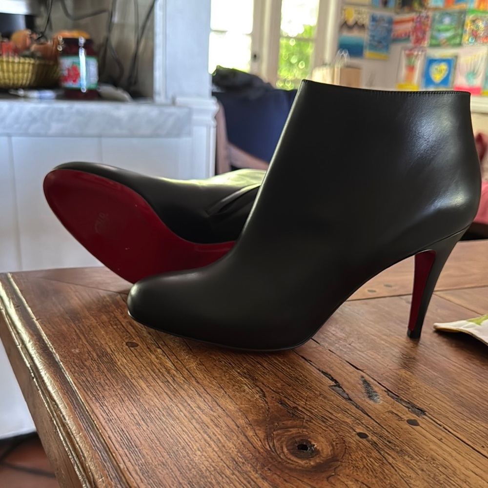 Christian Louboutin Black Heeled Boots with Red Sole